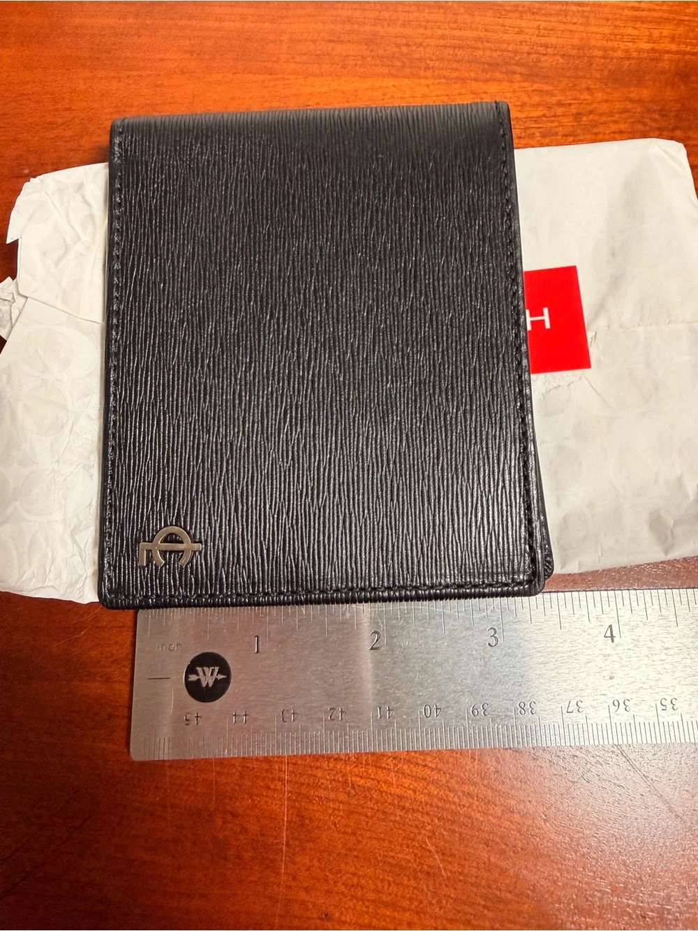 Coach Black Textured Leather Bi-Fold Wallet with Silver Coach Logo